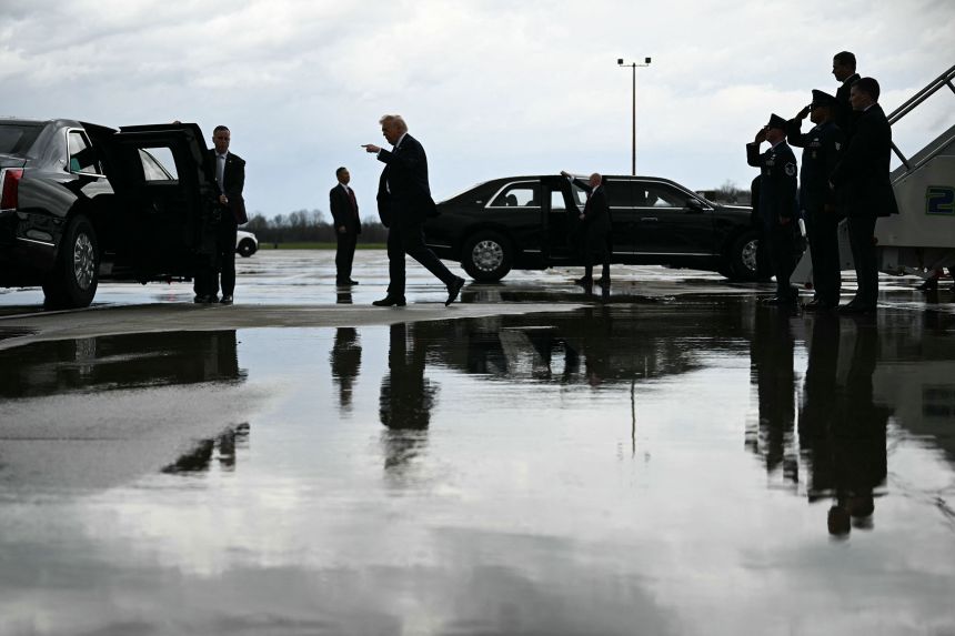 President Donald Trump steps off Air Force One upon arrival at Cincinnati/Northern Kentucky International Airport in Hebron, Kentucky, on March 11, 2026.