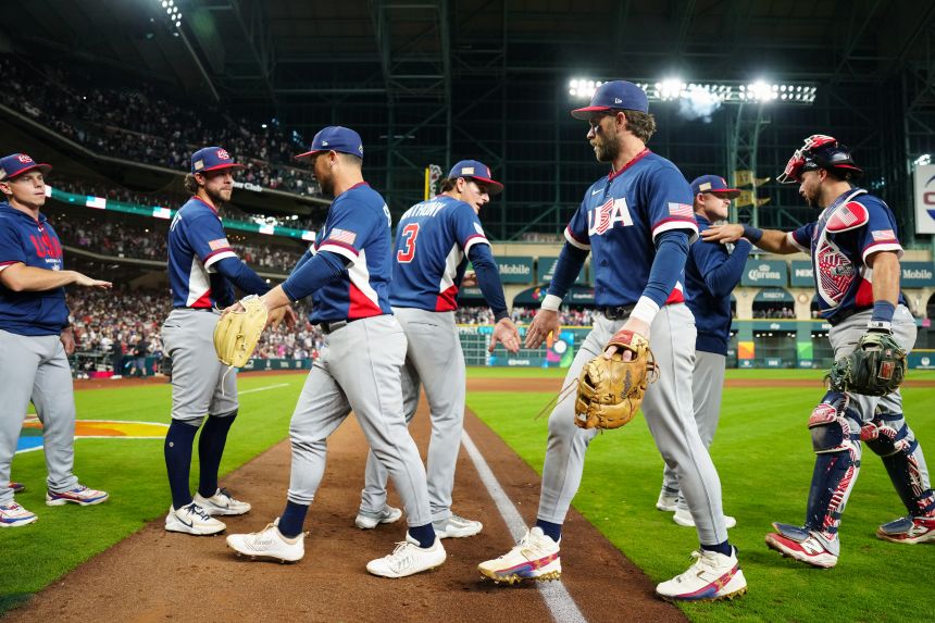 Team USA players shake hands after defeating Canada 5-3 Friday night in Houston.