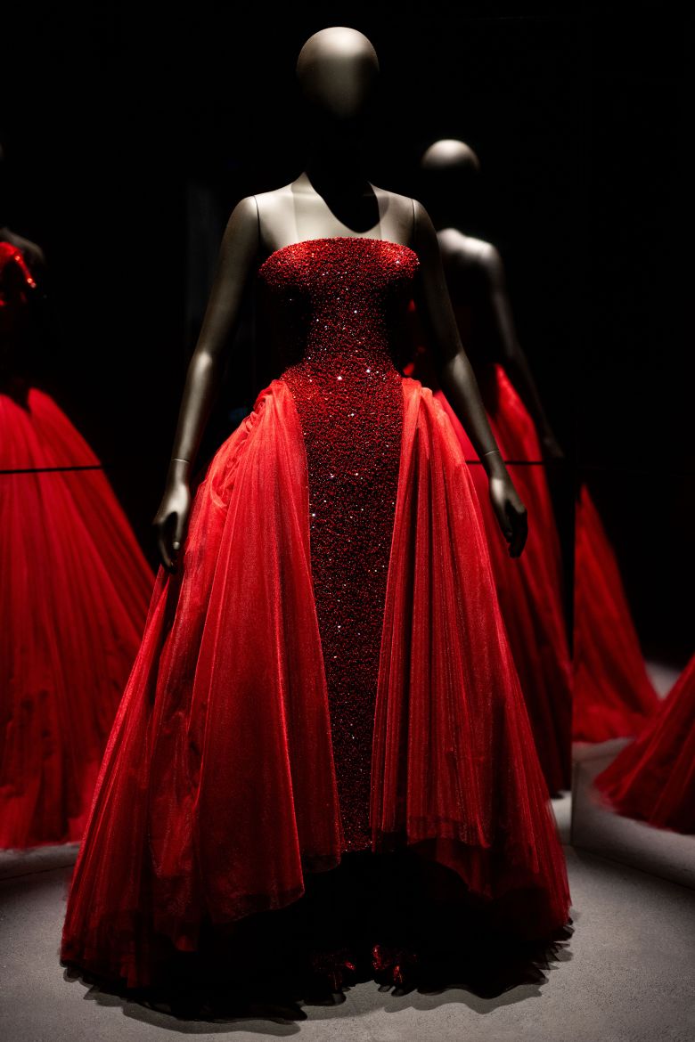 Ariana Grande's 2025 Oscars ball gown, currently on loan to the V&A Museum, is displayed in the exhibition.