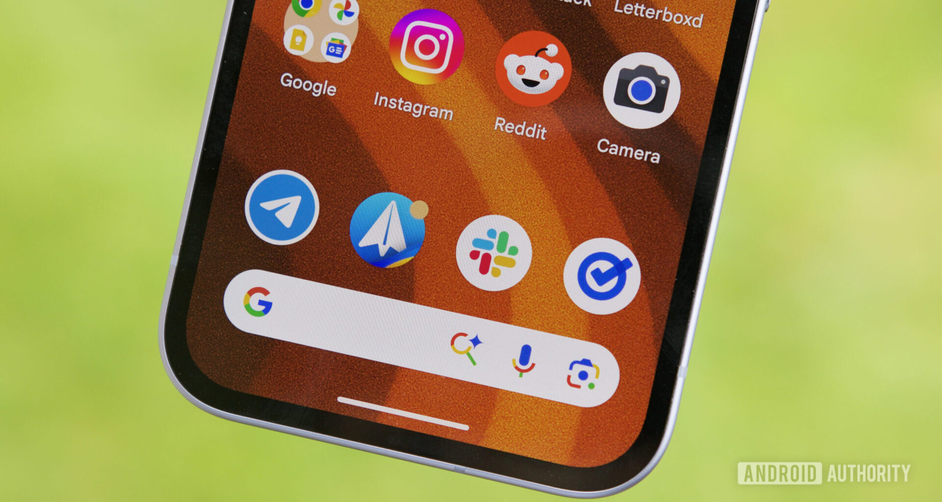 AI Mode icon on the Google Search bar on a Pixel phone.