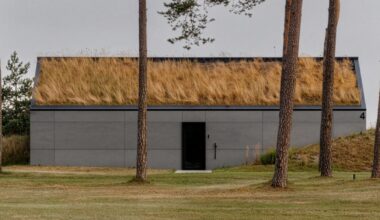 seaside home repurposes abandoned military bunkers in latvia