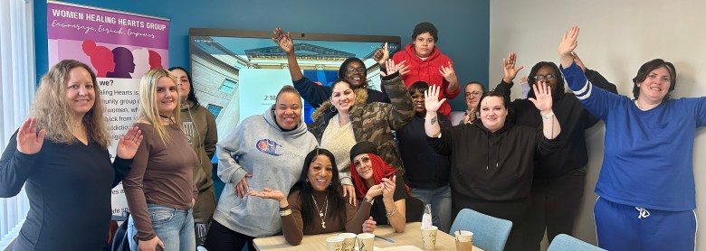 group shot of women looking triumphant