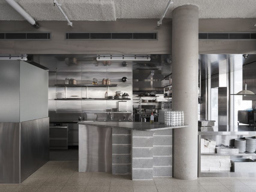 Kitchen with concrete and metal surfaces