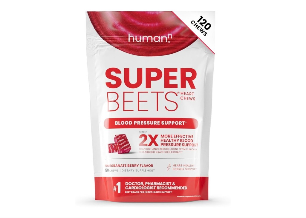A white and red pouch of Super Beets Heart Chews in Pomegranate Berry flavor.