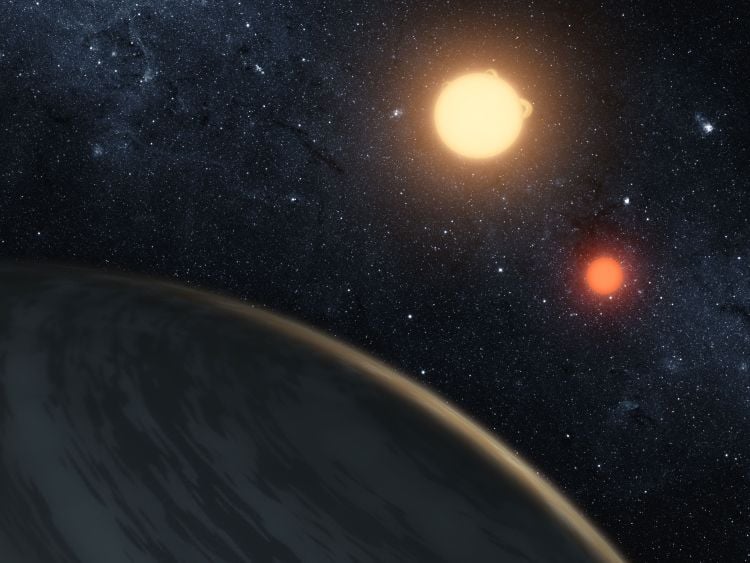 Artist's illustration of an exoplanet orbiting two stars. (Credit: NASA/JPL-Caltech/T. Pyle)