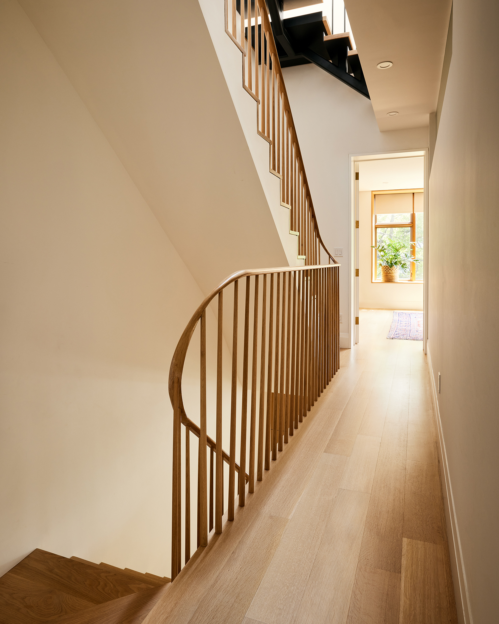 UPSTAIRS HALL WITH VIEW UNDERNEATH STAIRS