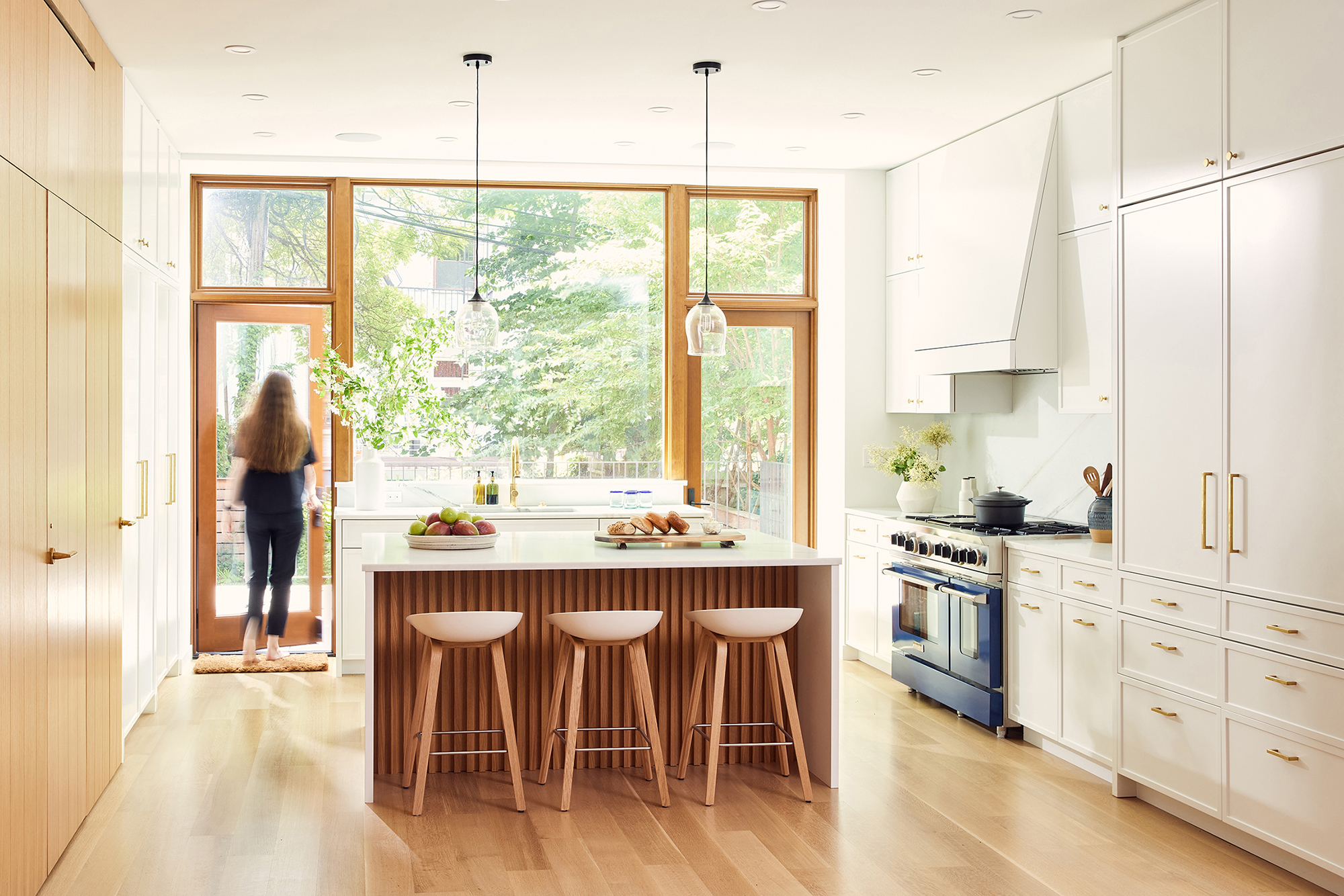 KITCHEN OVERALL ISLAND WITH STOOLS VIEW OF GLASS BACK WALL