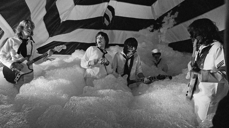 Rolling Stones performing in striped tent and bubbles