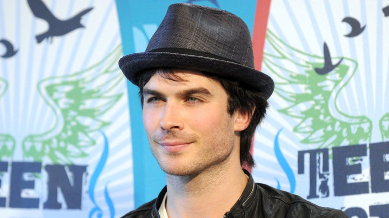 Ian Somerhalder posing for a photo at an event