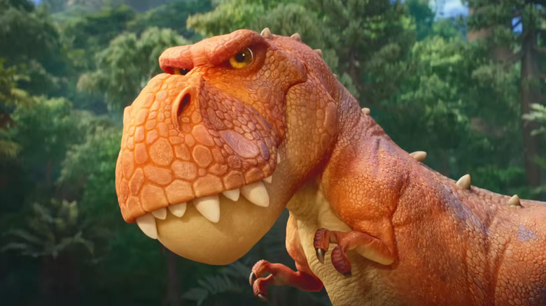 The T-rex looking to its left in Paw Patrol: The Dino Movie