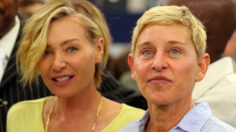 Portia de Rossi and Ellen DeGeneres attend a football game