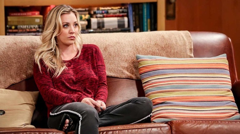 Penny sitting on the couch looking mad on The Big Bang Theory