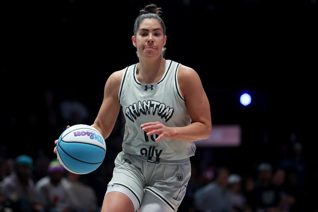 Kelsey Plum of the Phantom dribbles a basketball against the Mist.