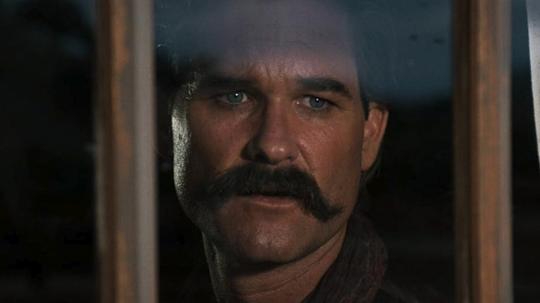 Kurt Russell's Wyatt Earp is seen in closeup in Tombstone