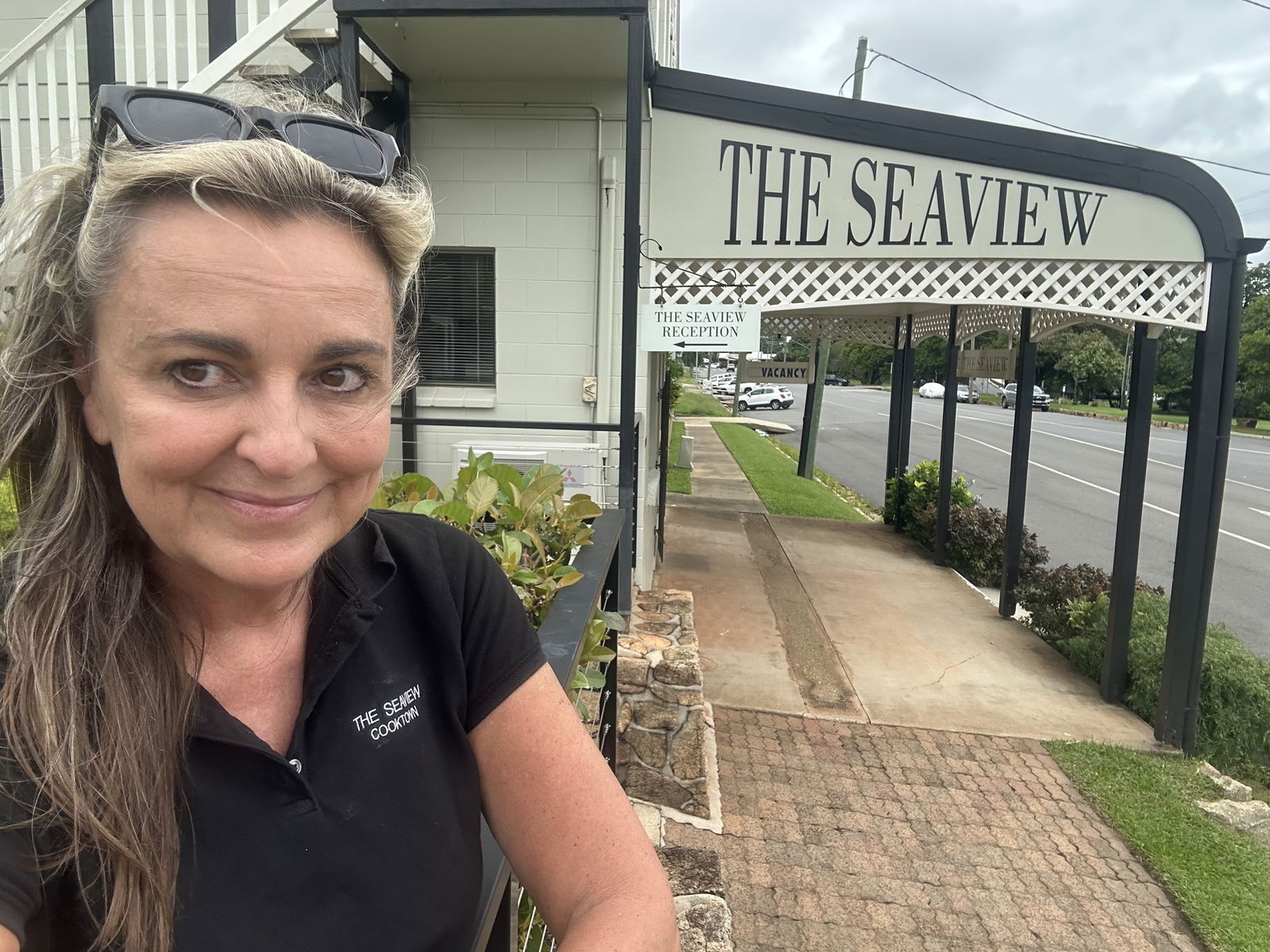 a woman outside a pub
