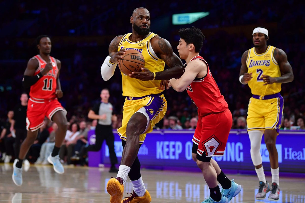 As Lakers’ LeBron James returns, he says he’s willing to sacrifice to win