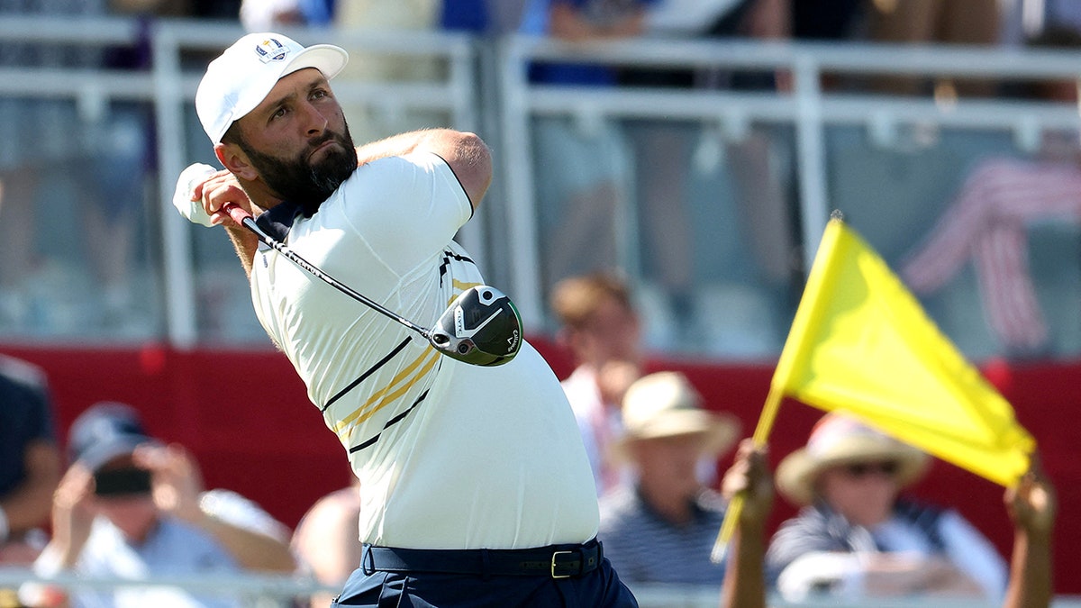 Jon Rahm tees off