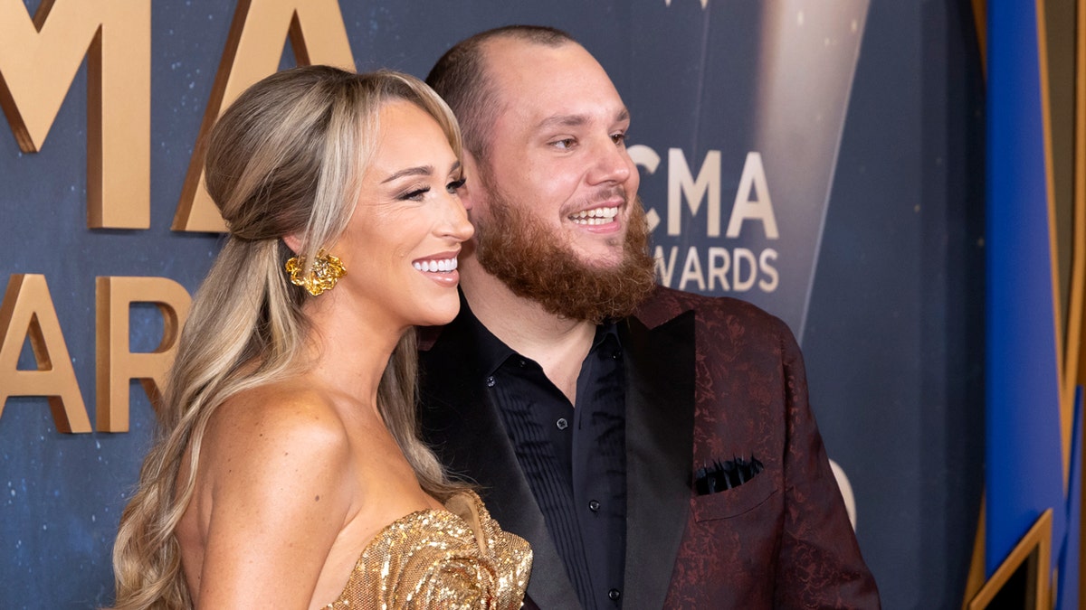 Nicole Hocking and Luke Combs attending the 59th Annual CMA Awards in Nashville.