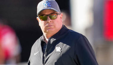 Feb 24, 2026; Columbia, South Carolina, USA; Kentucky Wildcats guard Otega Oweh (00) drives around South Carolina Gamecocks guard Meechie Johnson (5) during the second half at Colonial Life Arena. Mandatory Credit: Jeff Blake-Imagn