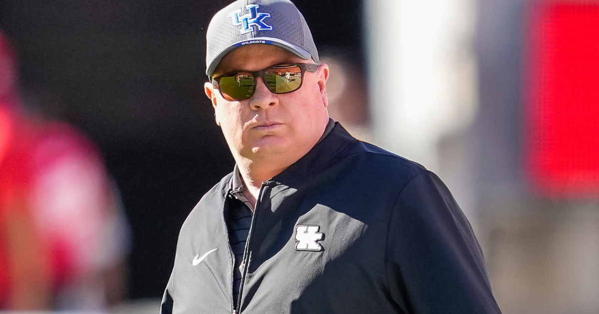 Feb 24, 2026; Columbia, South Carolina, USA; Kentucky Wildcats guard Otega Oweh (00) drives around South Carolina Gamecocks guard Meechie Johnson (5) during the second half at Colonial Life Arena. Mandatory Credit: Jeff Blake-Imagn