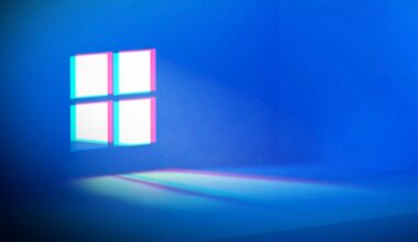 Windows logo on a dark blue background.