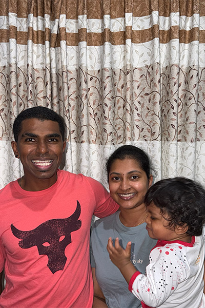 Prathab with his wife and son