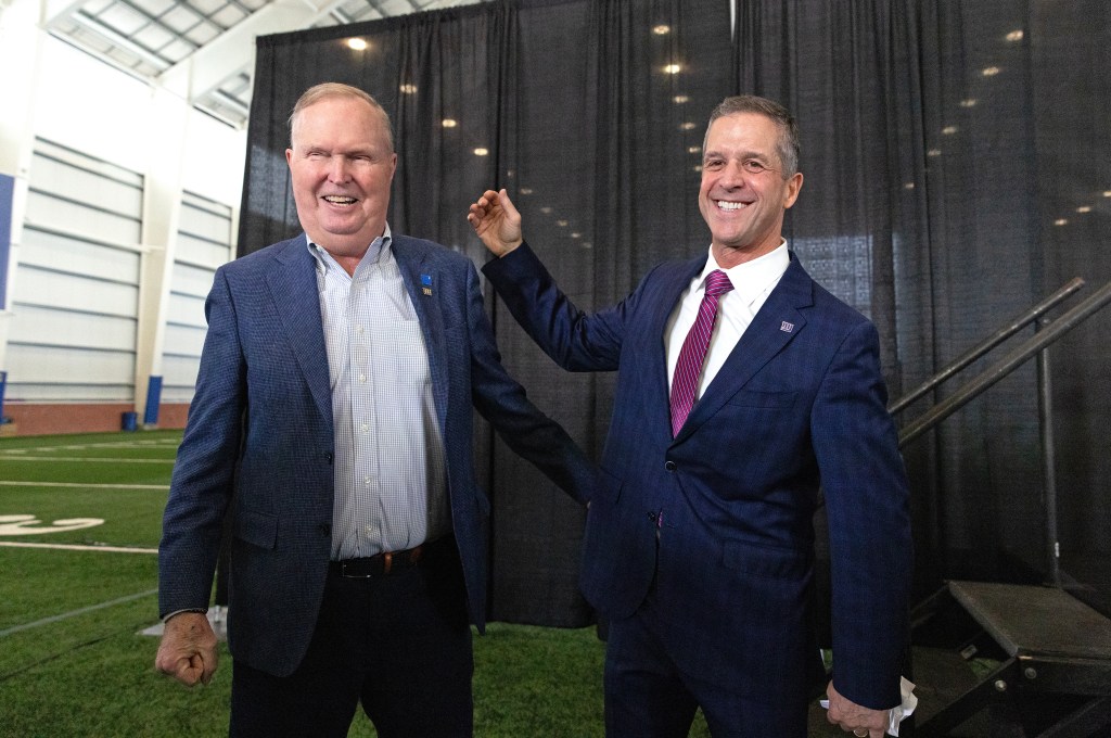 Giants owner John Mara (l.) and head coach John Harbaugh (r.) during Harbaugh's introduction on Jan. 20, 2026.