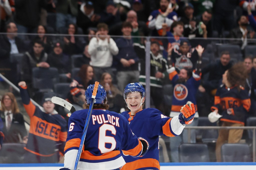 New York Islanders defenseman Matthew Schaefer celebrates his goal with teammate Ryan Pulock (6).