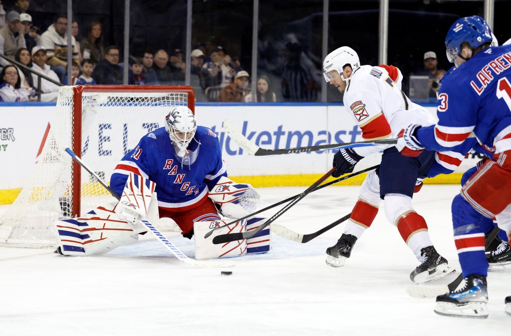 Rangers goaltender Igor Shesterkin (31)makes a save on a shot by the Florida Panthers defenseman Dmitry Kulikov (7) on March 29, 2026.