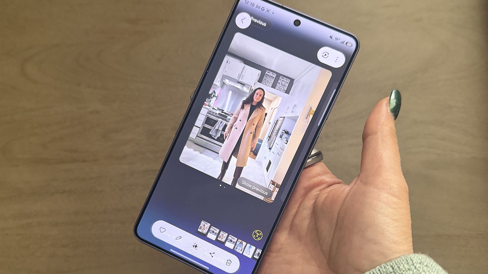 Samsung Galaxy S26 Ultra with an image of a woman on screen