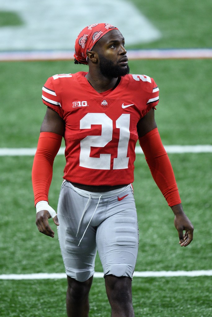 Ohio State Buckeyes cornerback Marcus Williamson (21) warms up.