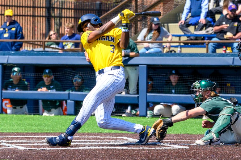 Greg Pace Jr. swings at the baseball.