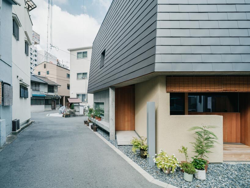 concrete and timber converse in osaka residence through an interplay of solid and void - 3