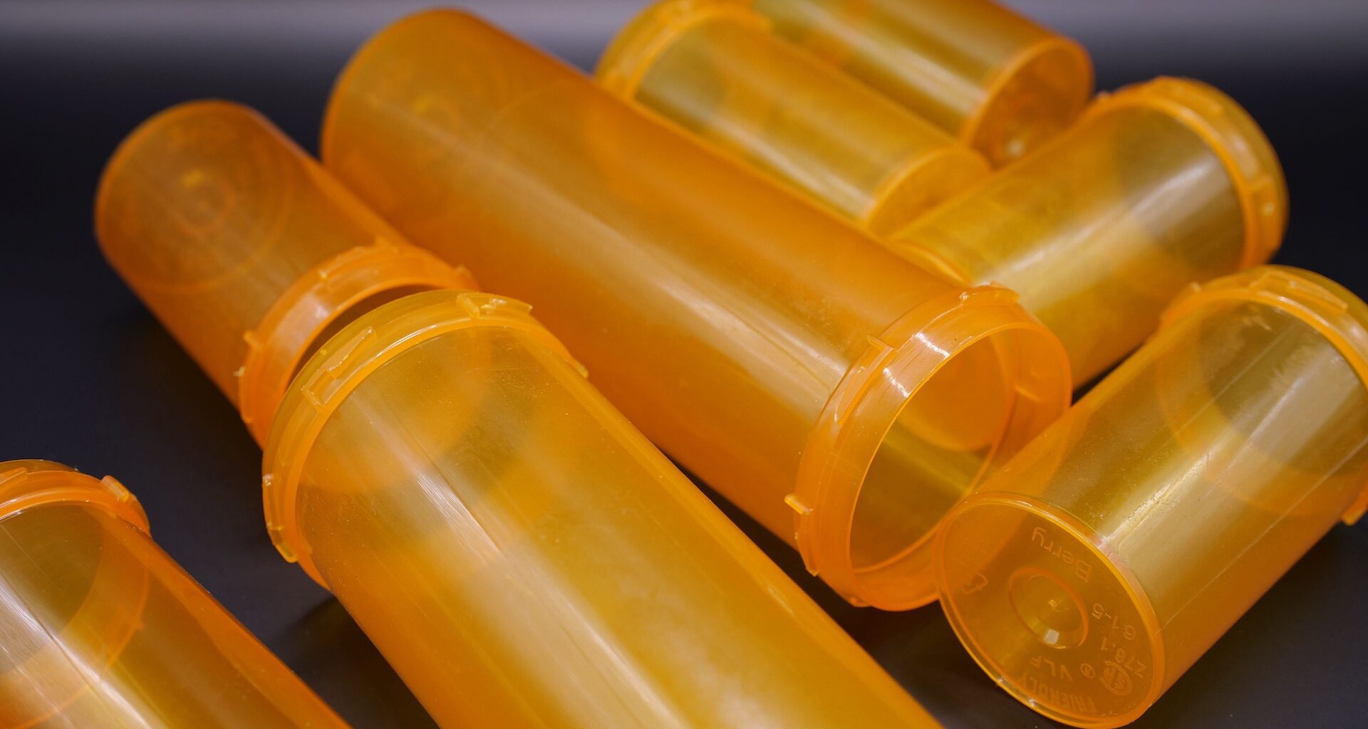 Discover how to make a stylish DIY light fixture using recycled pill bottles in this fun crafting project.