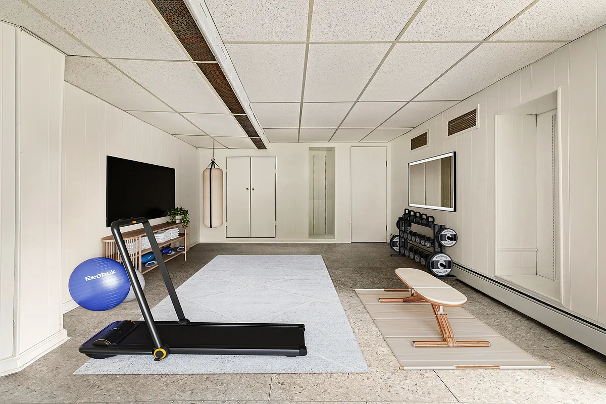 basement room set up as a gym