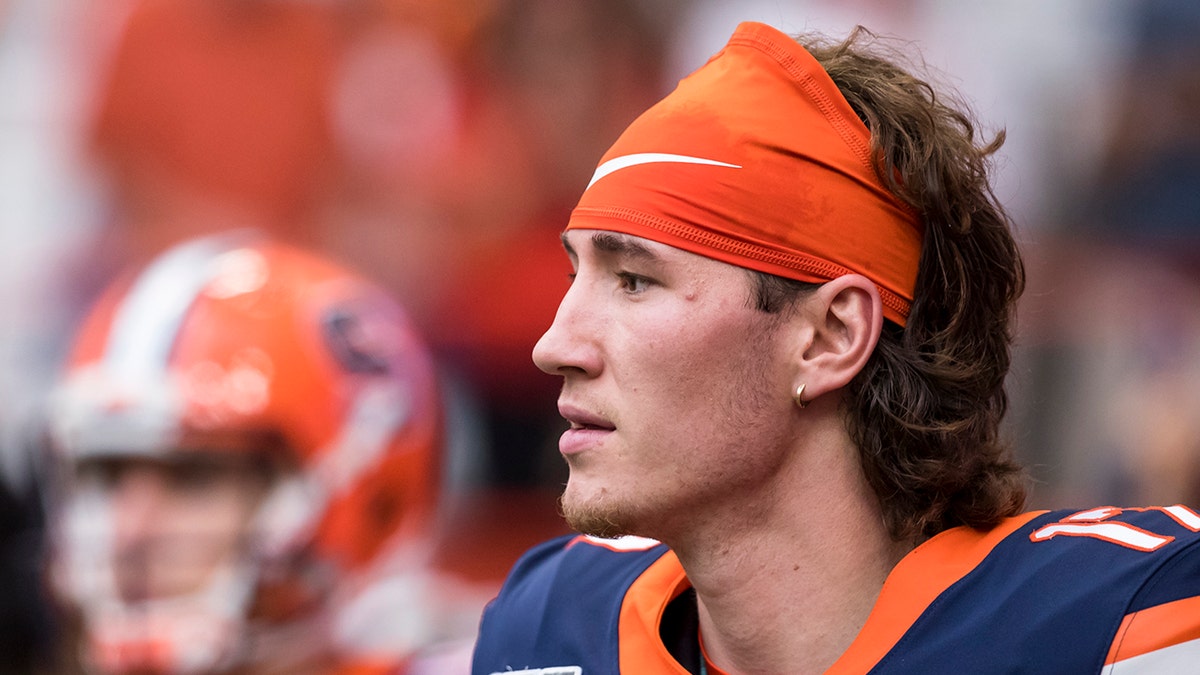 Rex Culpepper looks on field