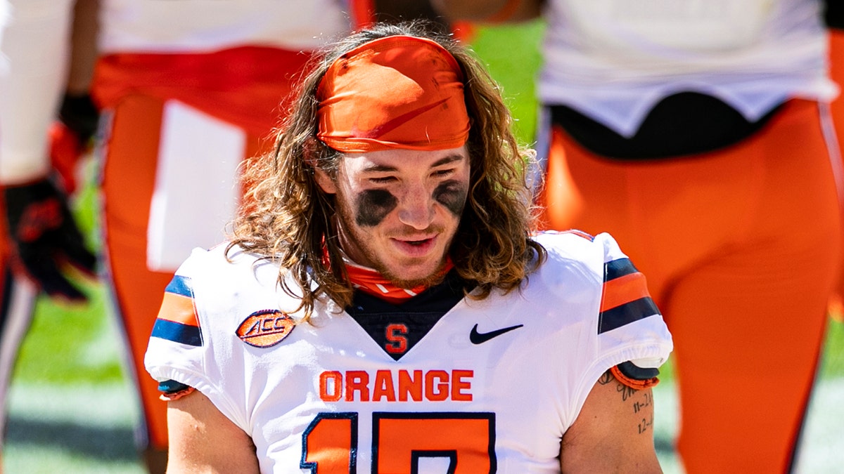 Rex Culpepper looks on field