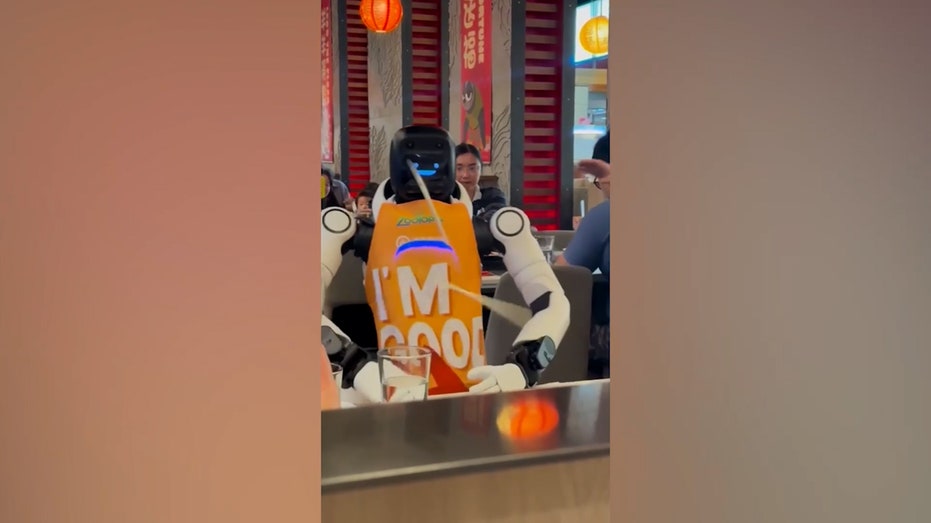 a robot slams table, sending chopsticks flying