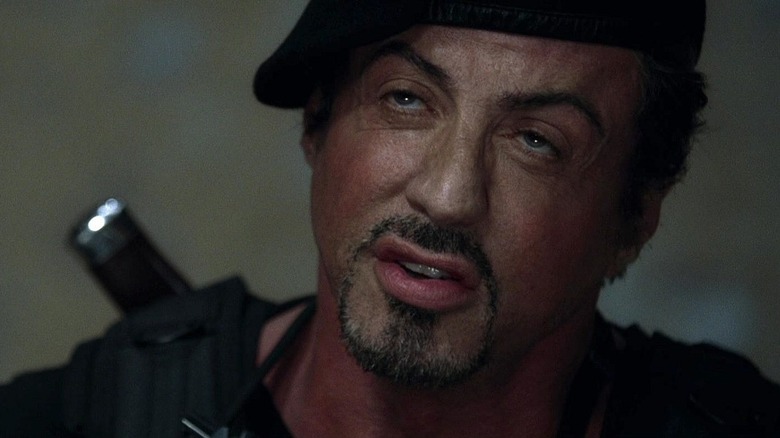 Barney swunting at something in The Expendables