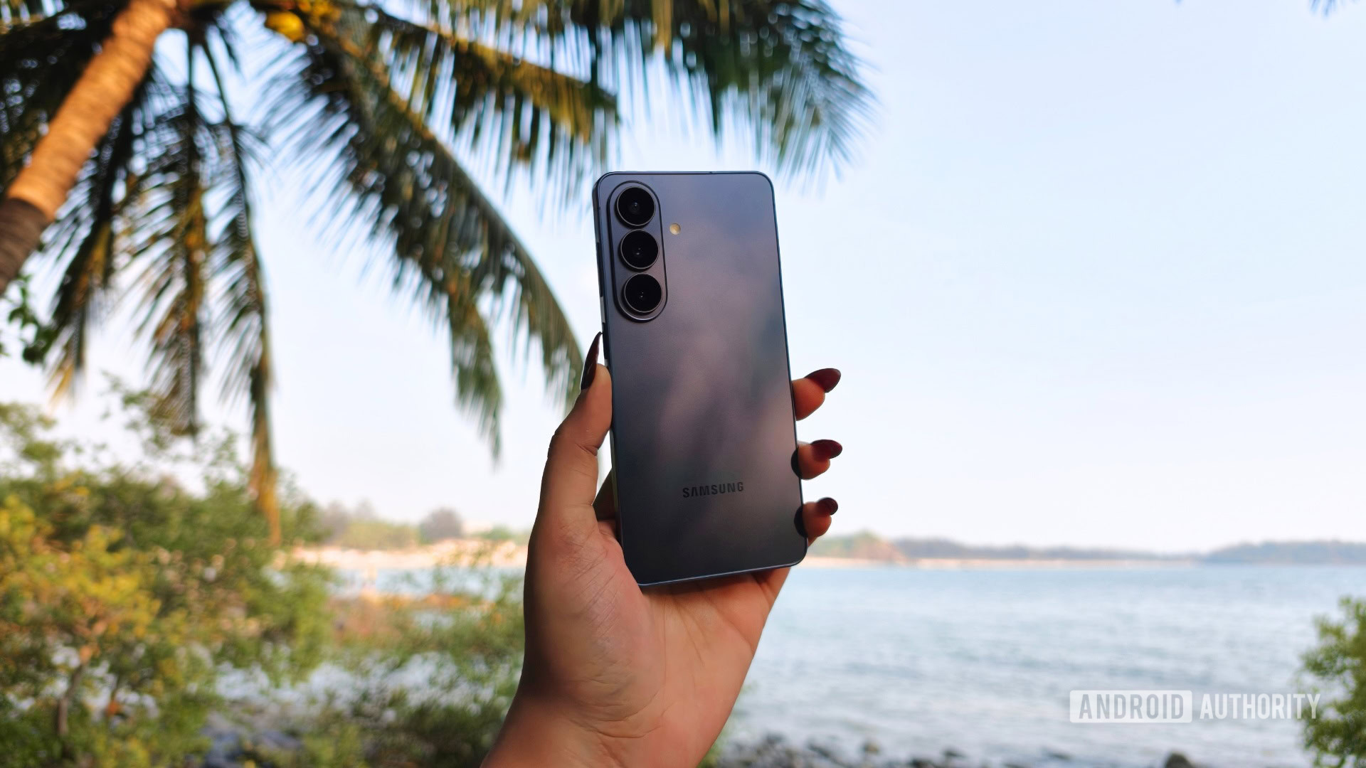 Someone holding the Galaxy S26, showing the back of the phone.