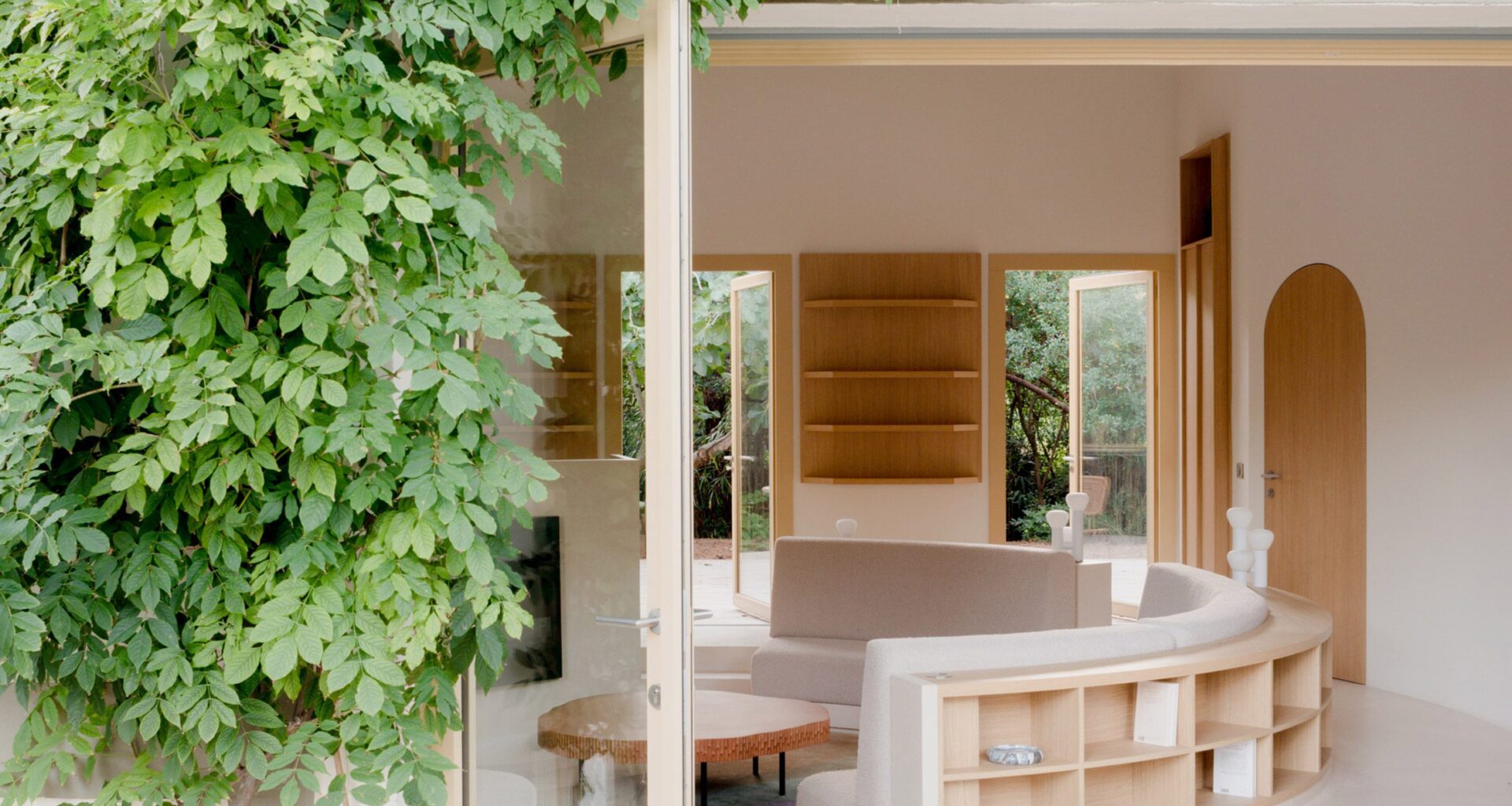 Studio Razavi adds circular conversation pit to coastal home