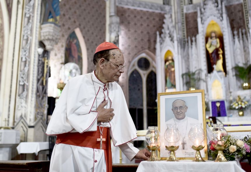 Cardinal Oswald Gracias prays before a photograph of Pope Francis after Mass at the Cathedral of the Holy Name in Mumbai, India, on April 21, 2025.