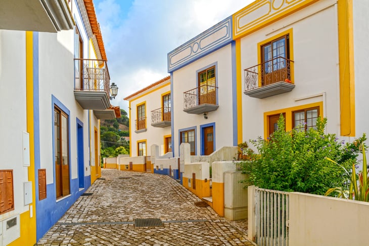 Village street with residential buildings in the Algarve region of Portugal