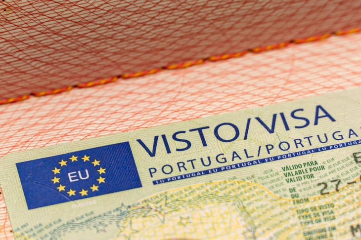 Schengen visa of Portugal in a passport.