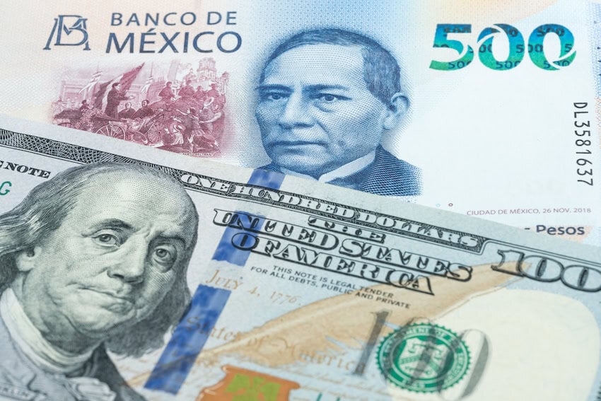 500 Mexican peso and US 100 dollar banknotes. International trade concept