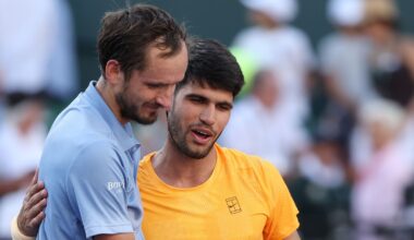Carlos Alcaraz of Spain, right, hugs Daniil Medvedev after being defeated during their Men's Singles Semifinals match on Day 11 of the BNP P
