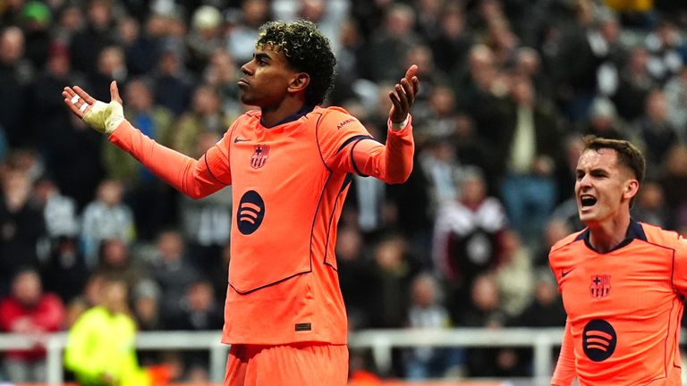 Barcelona's Lamine Yamal celebrates after scoring late in second-half injury time