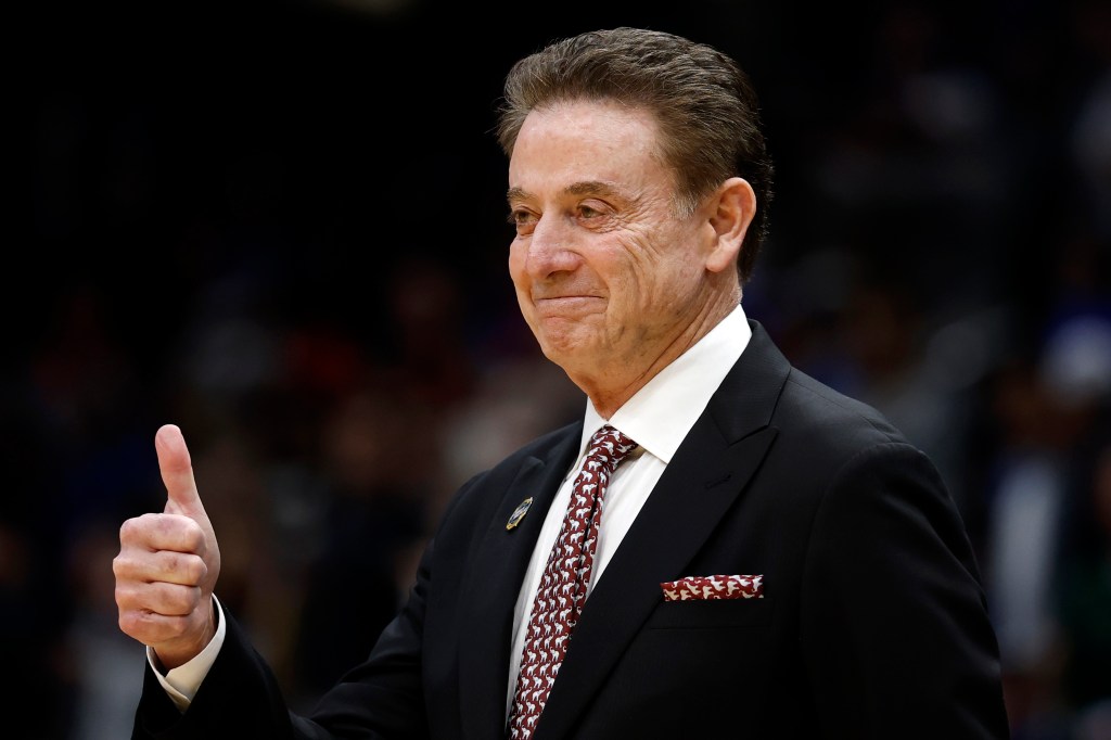 St. John's Red Storm head coach Rick Pitino giving a thumbs up.
