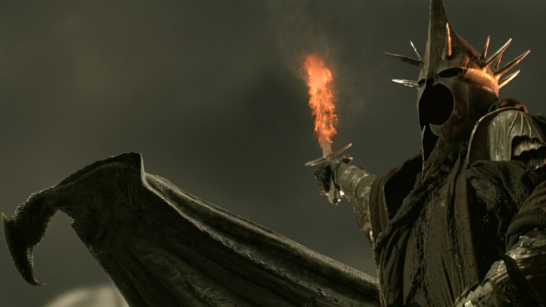 The Witch-king holds a fiery sword in The Return of the King