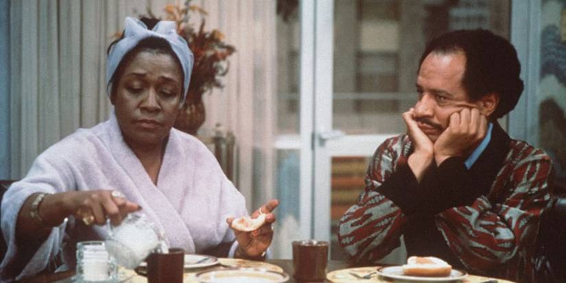 Louise (Isabel Sanford) and George (Sherman Hemsley) having breakfast in The Jeffersons.
